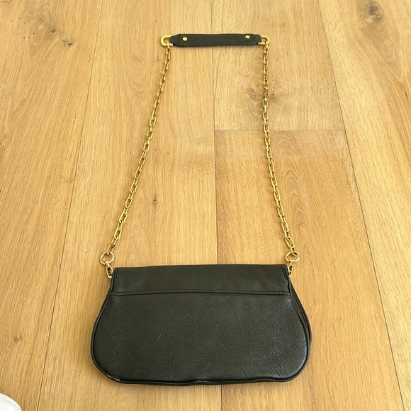 Tory Burch Reva Cross body leather black flap bag with gold chain strap. - Picture 10 of 11